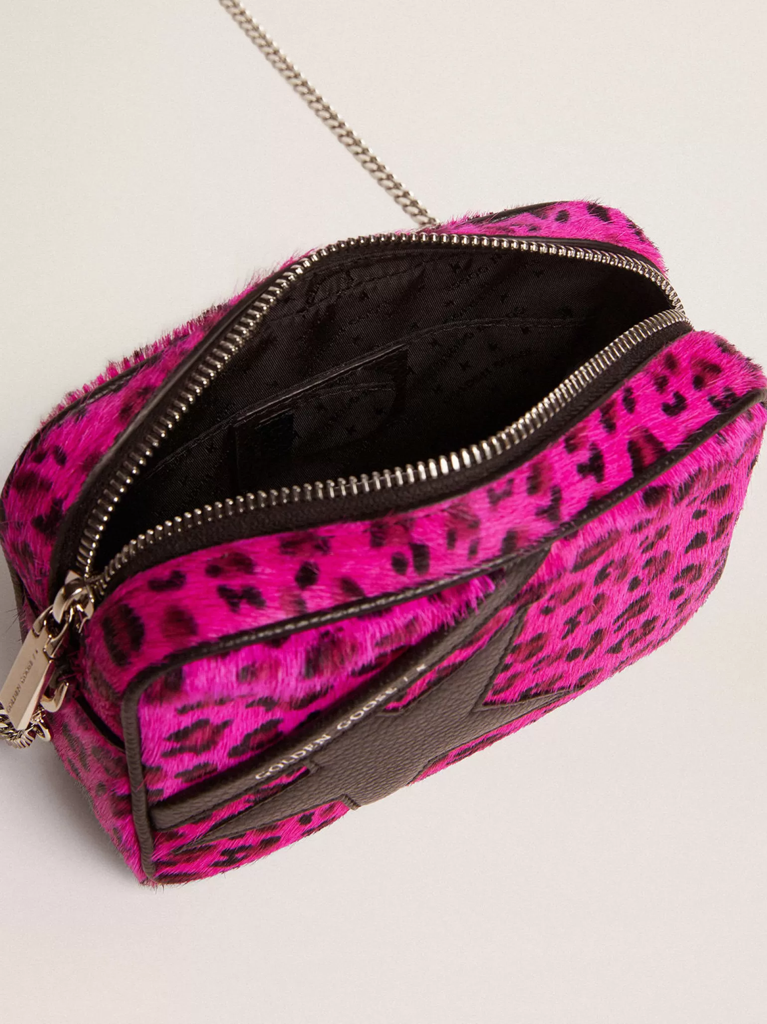 Shop Bolsa Mini Star de couro cavalinho com estampa de leopardo fúcsia e estrela de couro preta MULHER Minibolsas | Bolsas tiracolo