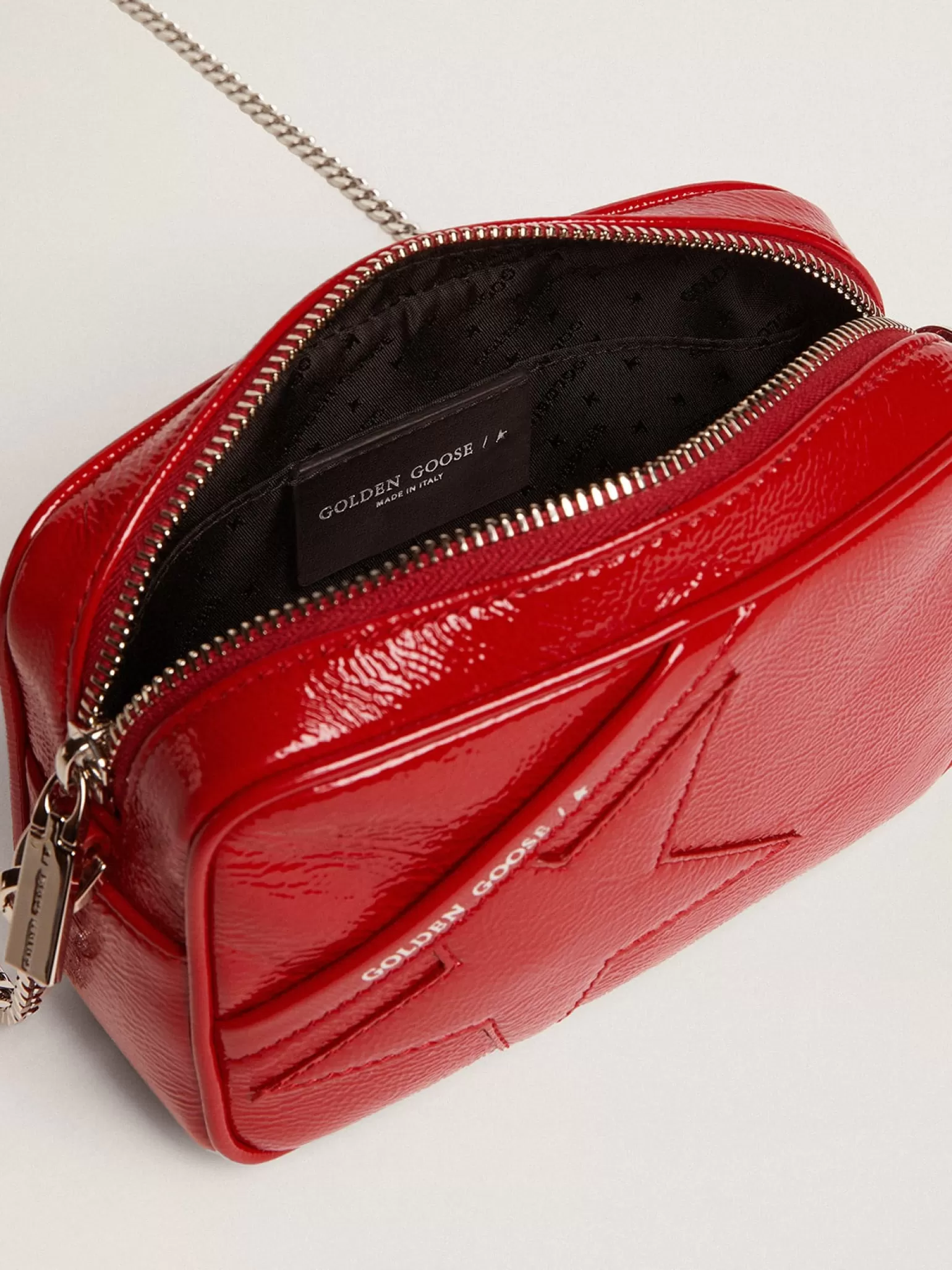 New Bolsa Mini Star feminina de couro pintado vermelho com estrela tom sobre tom MULHER Minibolsas | Bolsas tiracolo