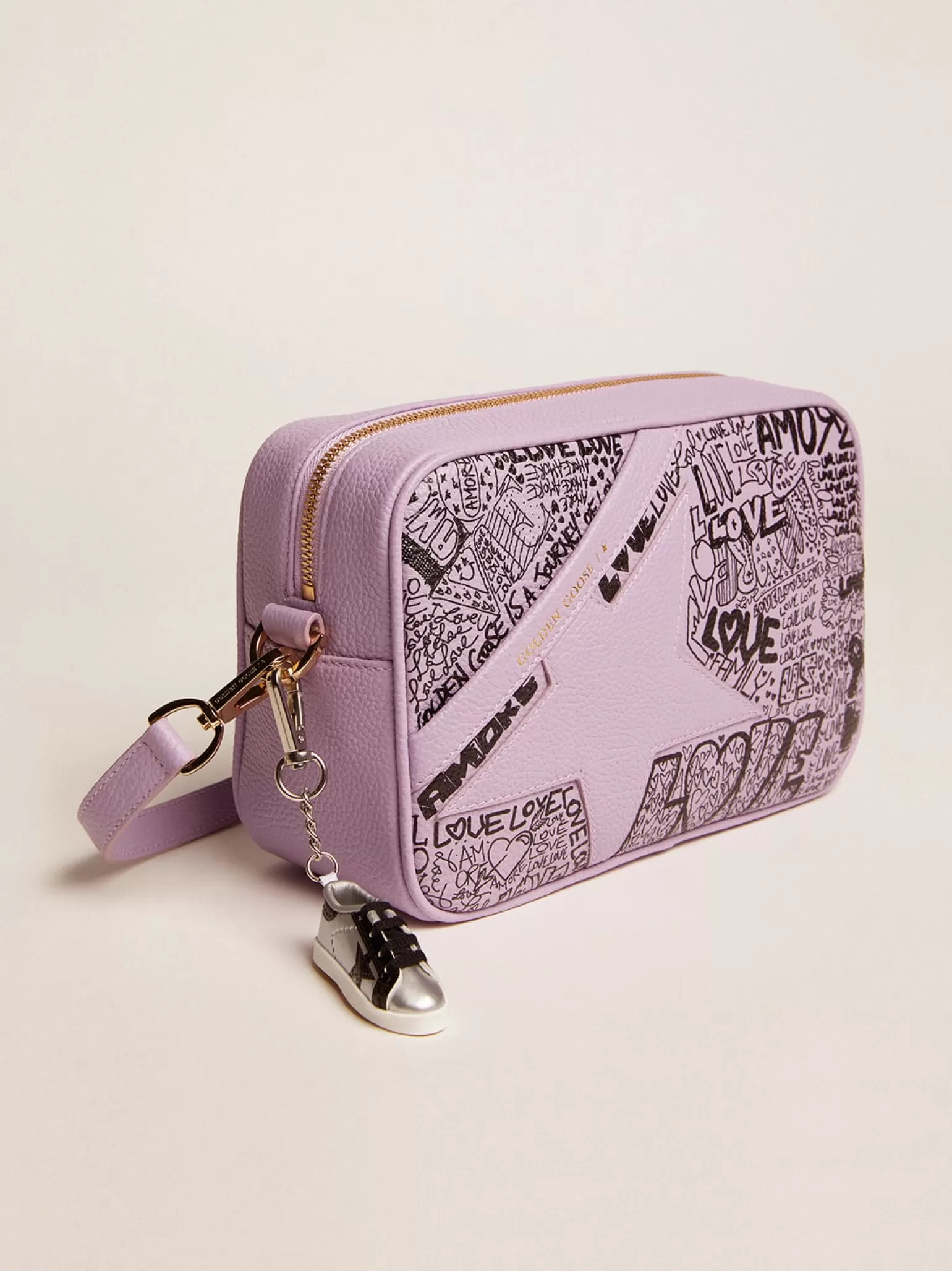 Clearance Bolsa Star de couro martelado lilás com estrela de couro tom sobre tom e estampa de grafite preto all-over MULHER Bolsas tiracolo