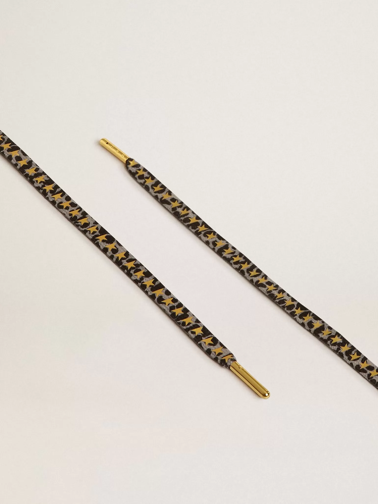 Hot Cadarços salpicados em branco e preto com estrelas douradas em contraste MULHER Cadarços | Cadarços
