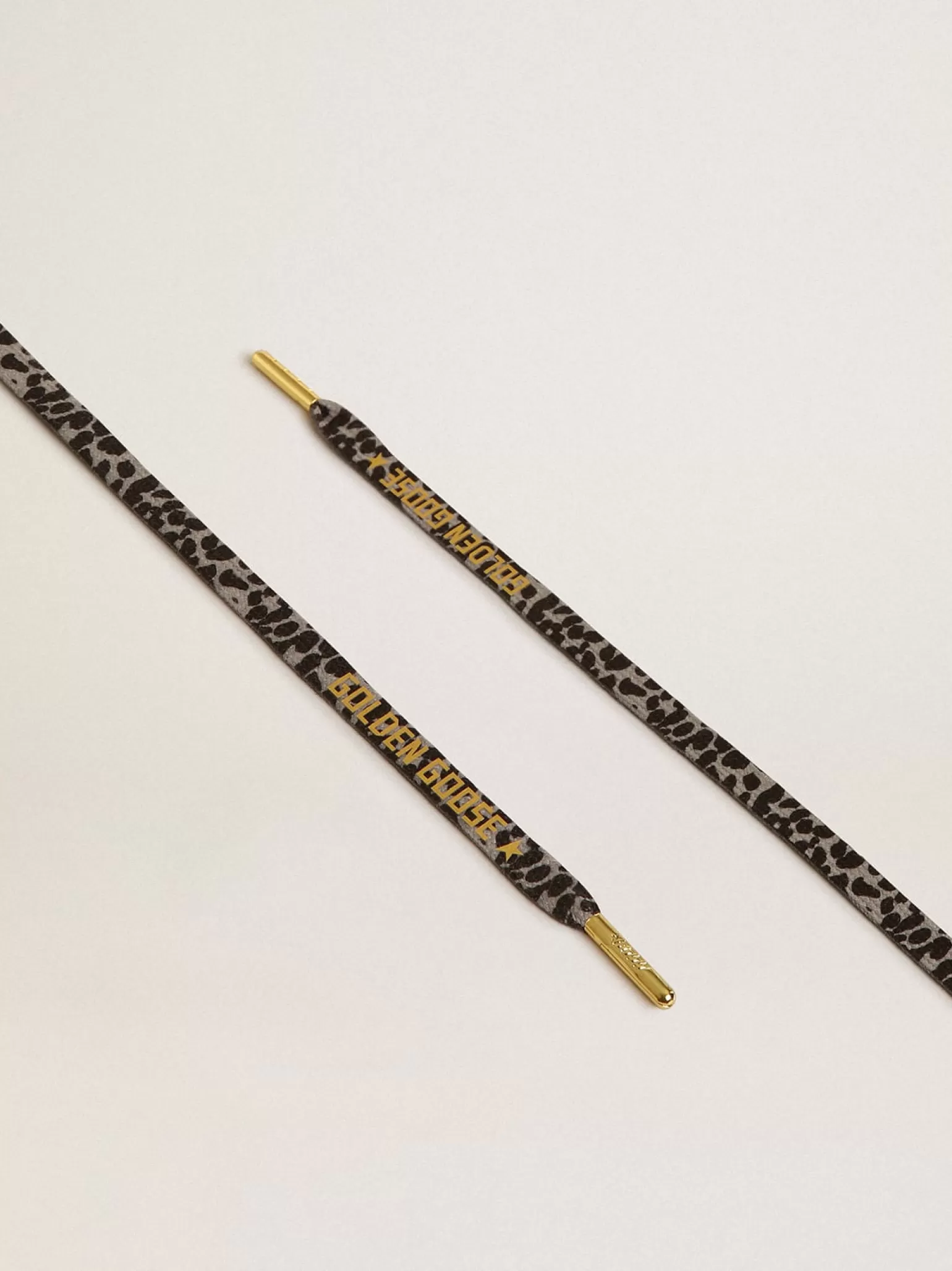 Fashion Cadarços salpicados em branco e preto com logo dourado em contraste MULHER Cadarços | Cadarços