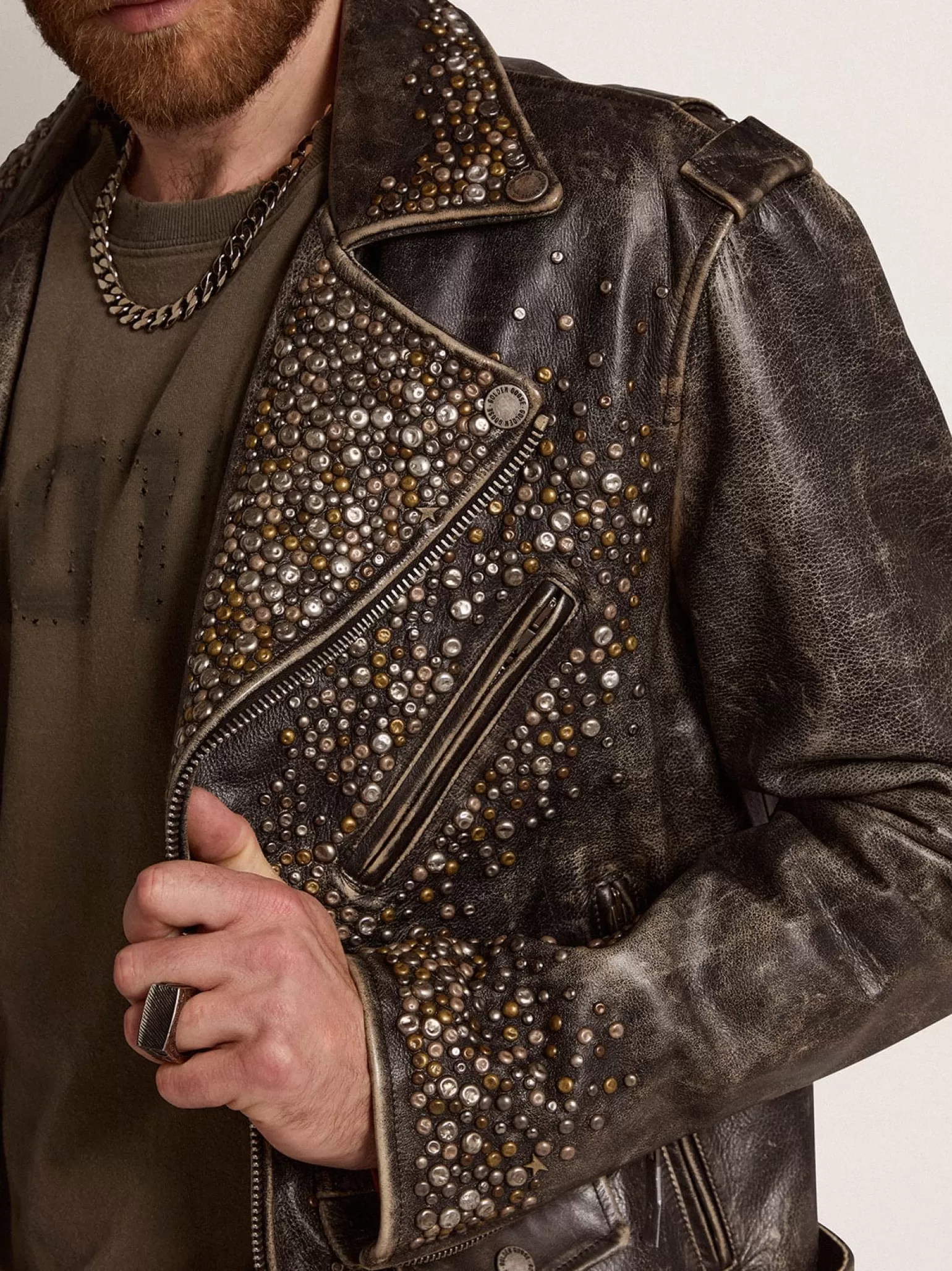 Clearance Jaqueta de couro masculina com tachas marteladas e fita aplicada Casacos e blusões