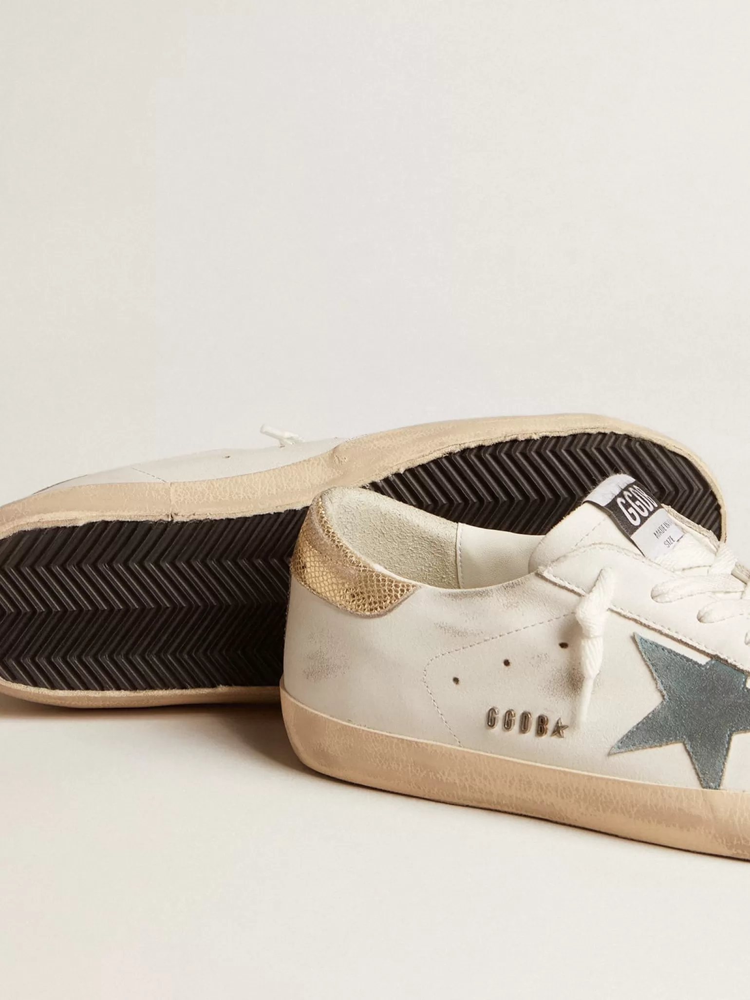 Best Sale Super-Star com estrela de suede e talão de couro estampa de píton platinado Super-Star