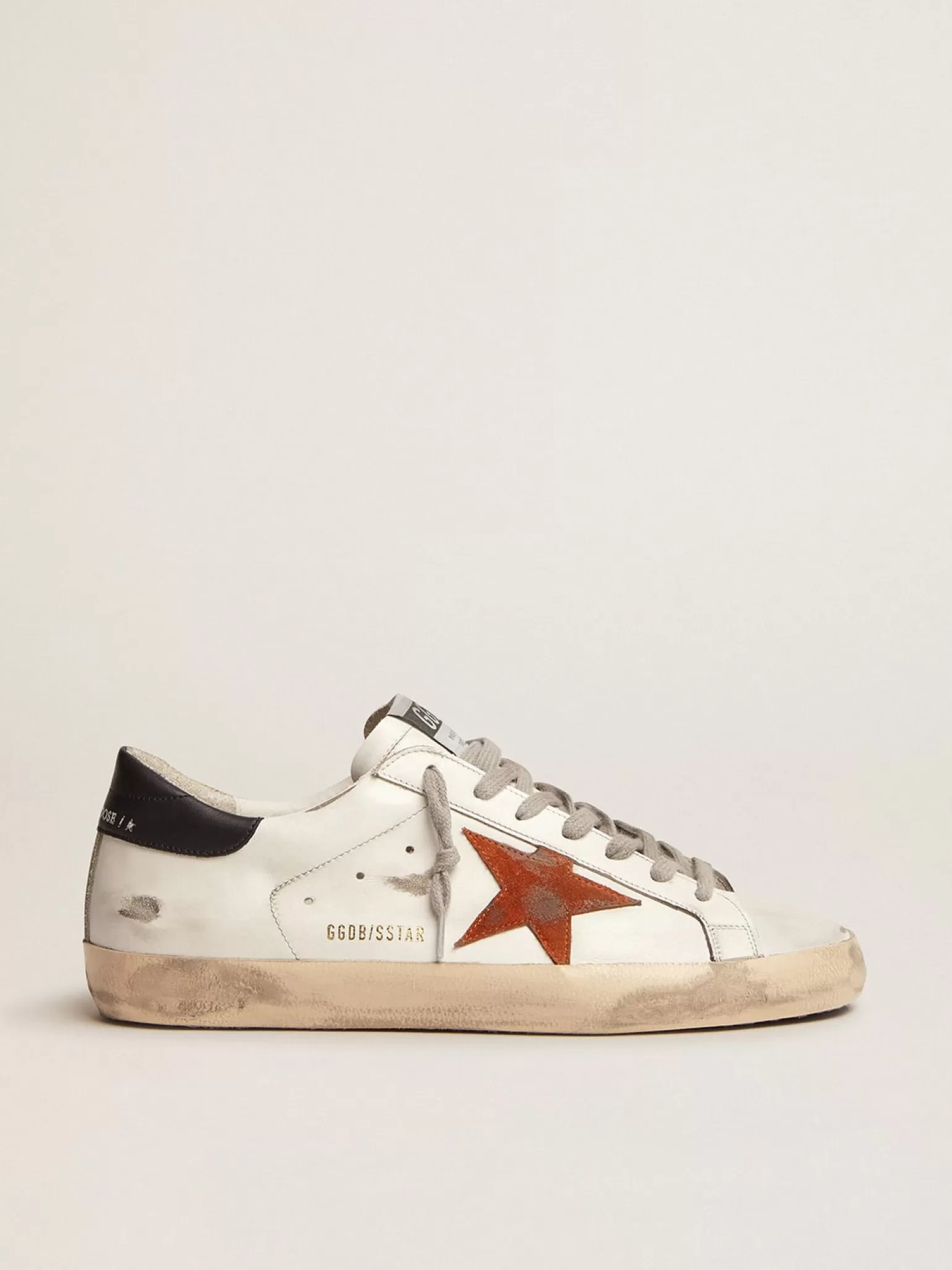 Shop Super-Star com estrela de suede laranja e talão de couro azul-escuro Super-Star