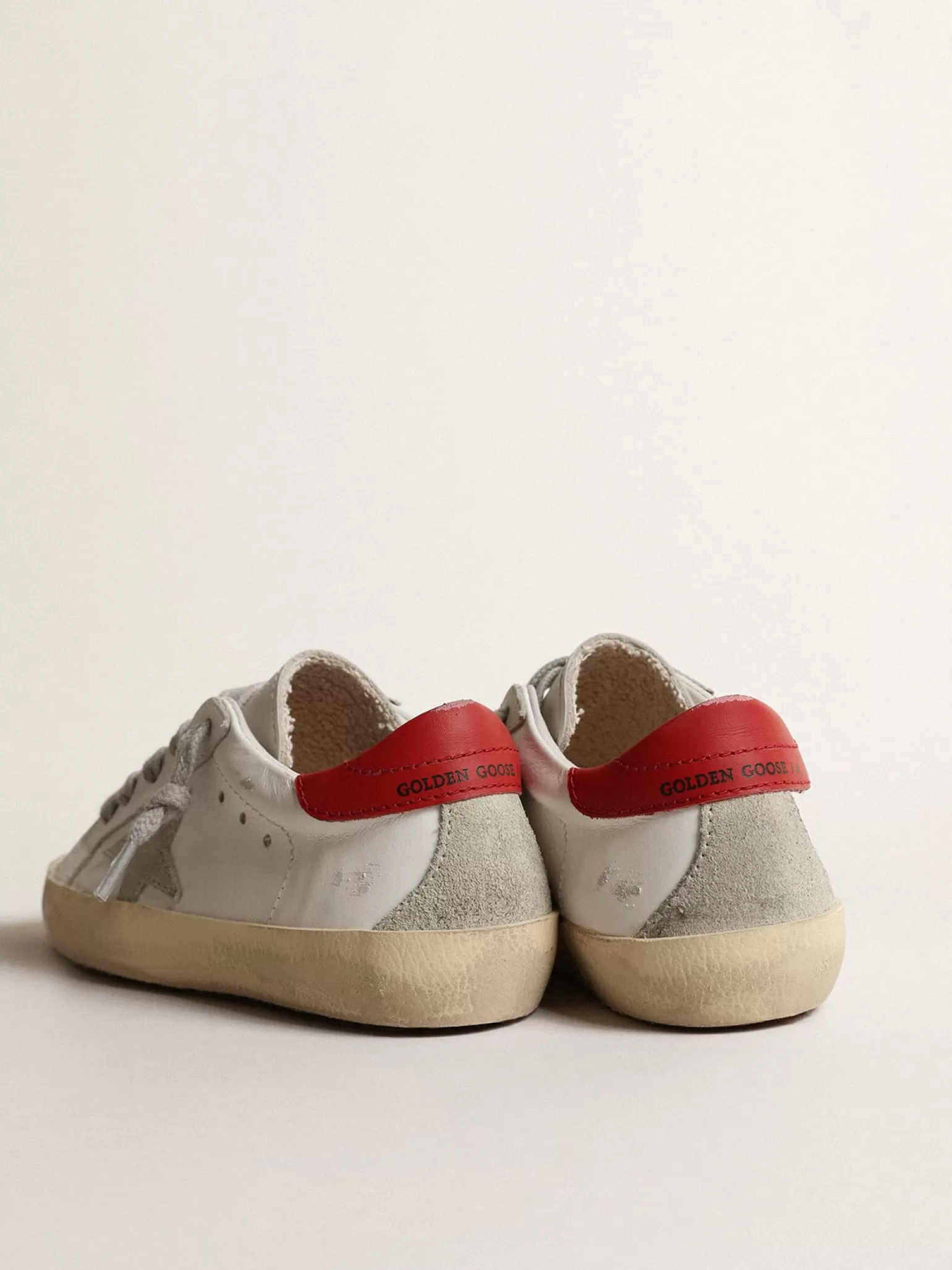 Clearance Super-Star Junior com estrela de suede e talão de couro vermelho Meninas pequenas (1-3 anos) | Meninos pequenos (1-3 anos)