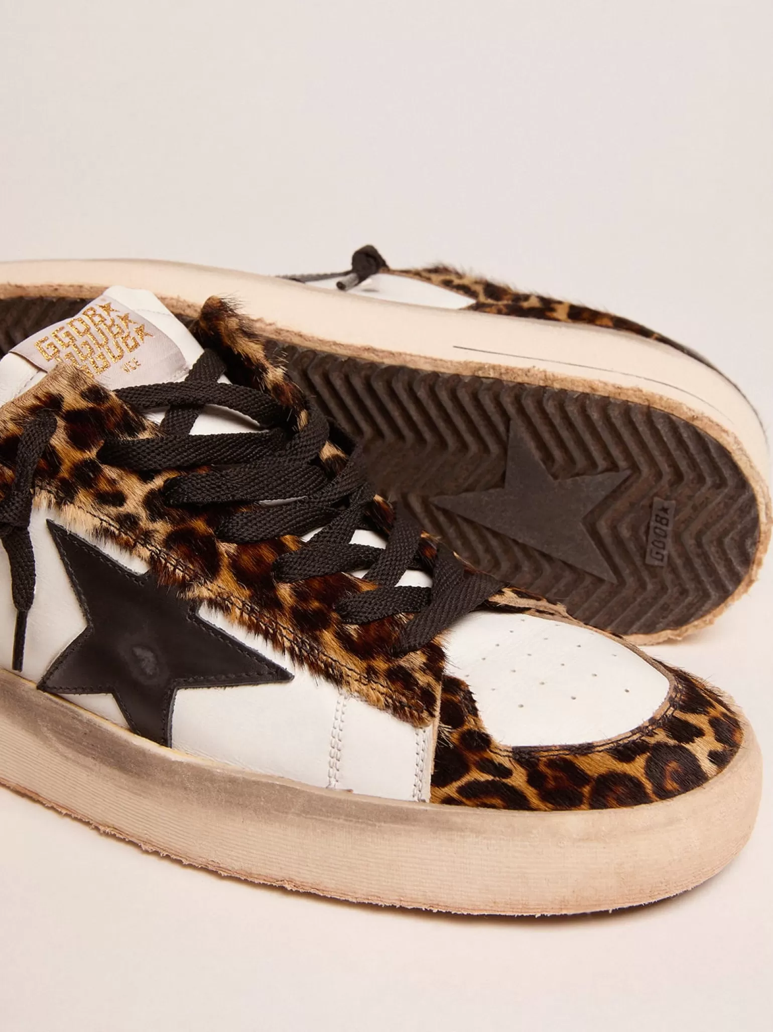 Outlet Tênis Stardan de couro cavalinho com estampa de leopardo e estrela preta MULHER Stardan